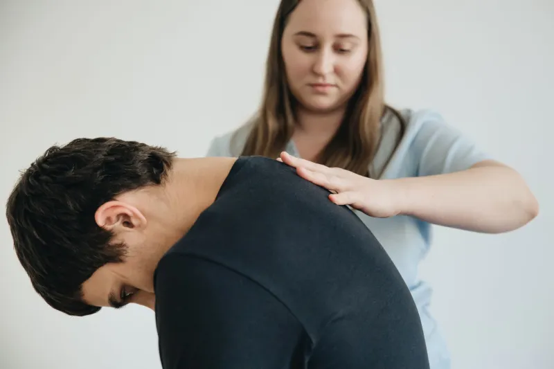 Living Lopsided: How Muscular Asymmetry Silently Compounds Into Chronic Pain — and What Massage Therapy Does About It